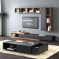 Modern living room with a black entertainment console and wooden shelves.