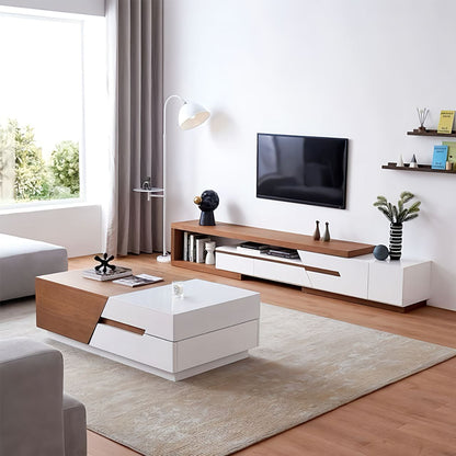 Modern living room with a white and wood entertainment console, coffee table, and decor items.