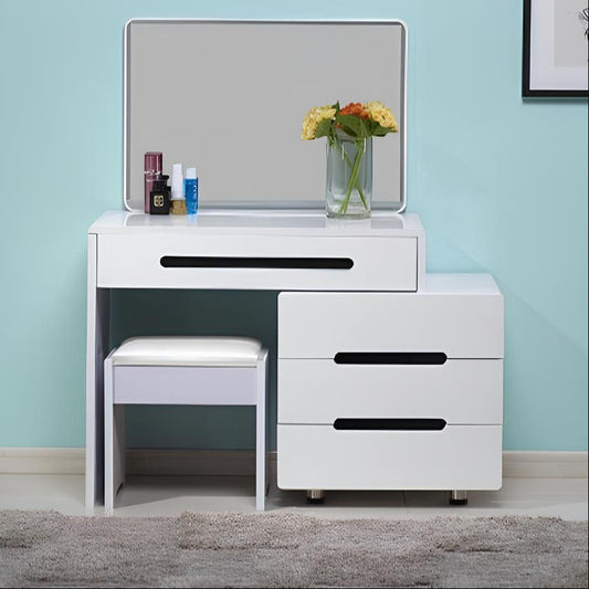 White vanity table with mirror and stool against a light blue wall.