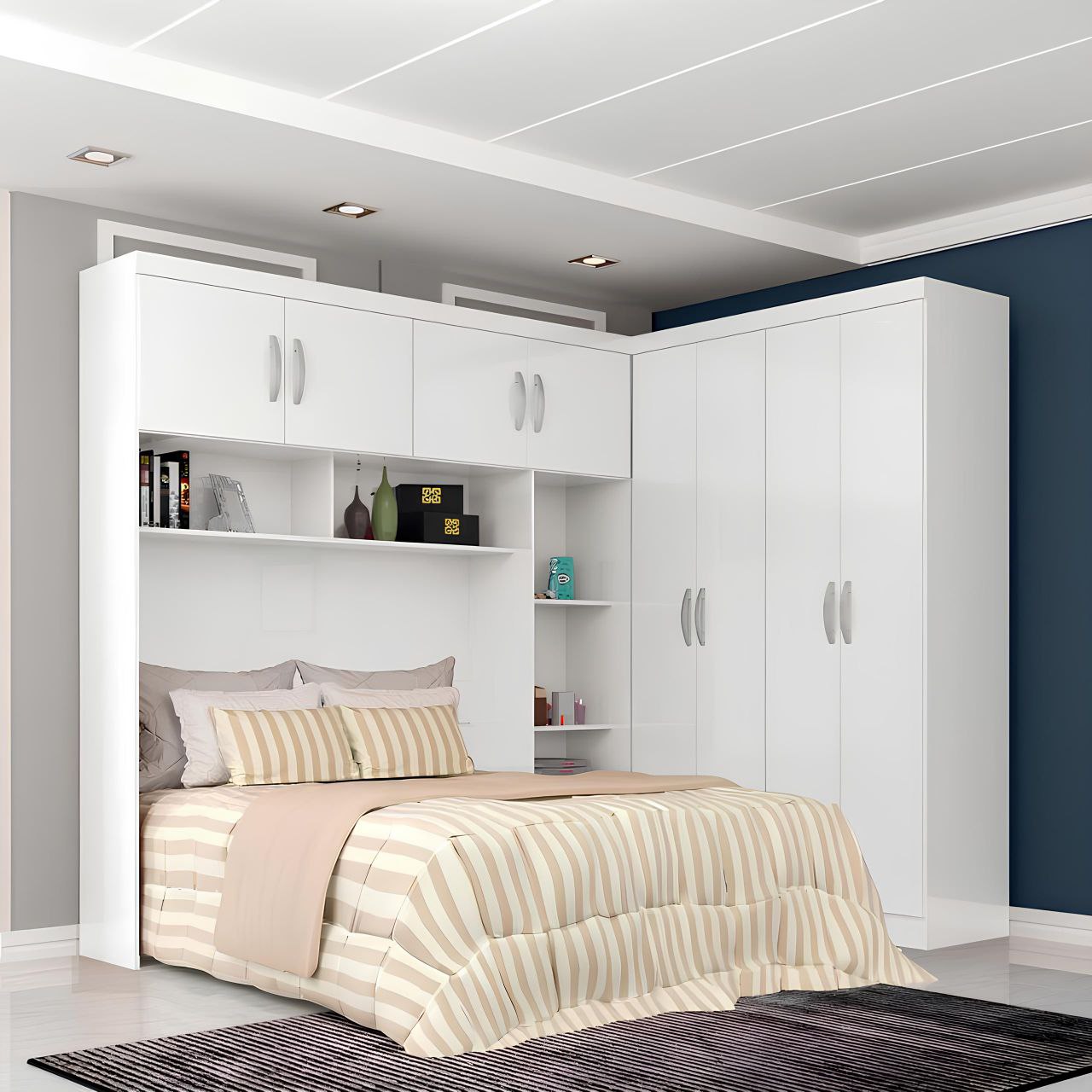 Modern bedroom with white storage cabinets and a bed with striped bedding.