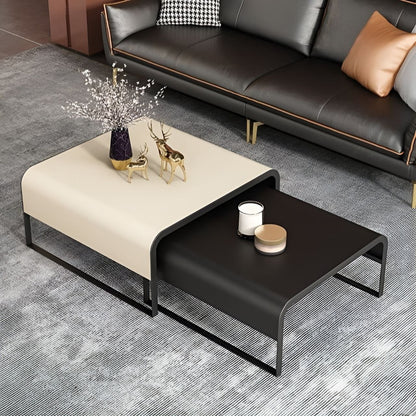 Modern coffee table with decorative items in a living room setting