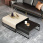 Modern coffee table with decorative items in a living room setting
